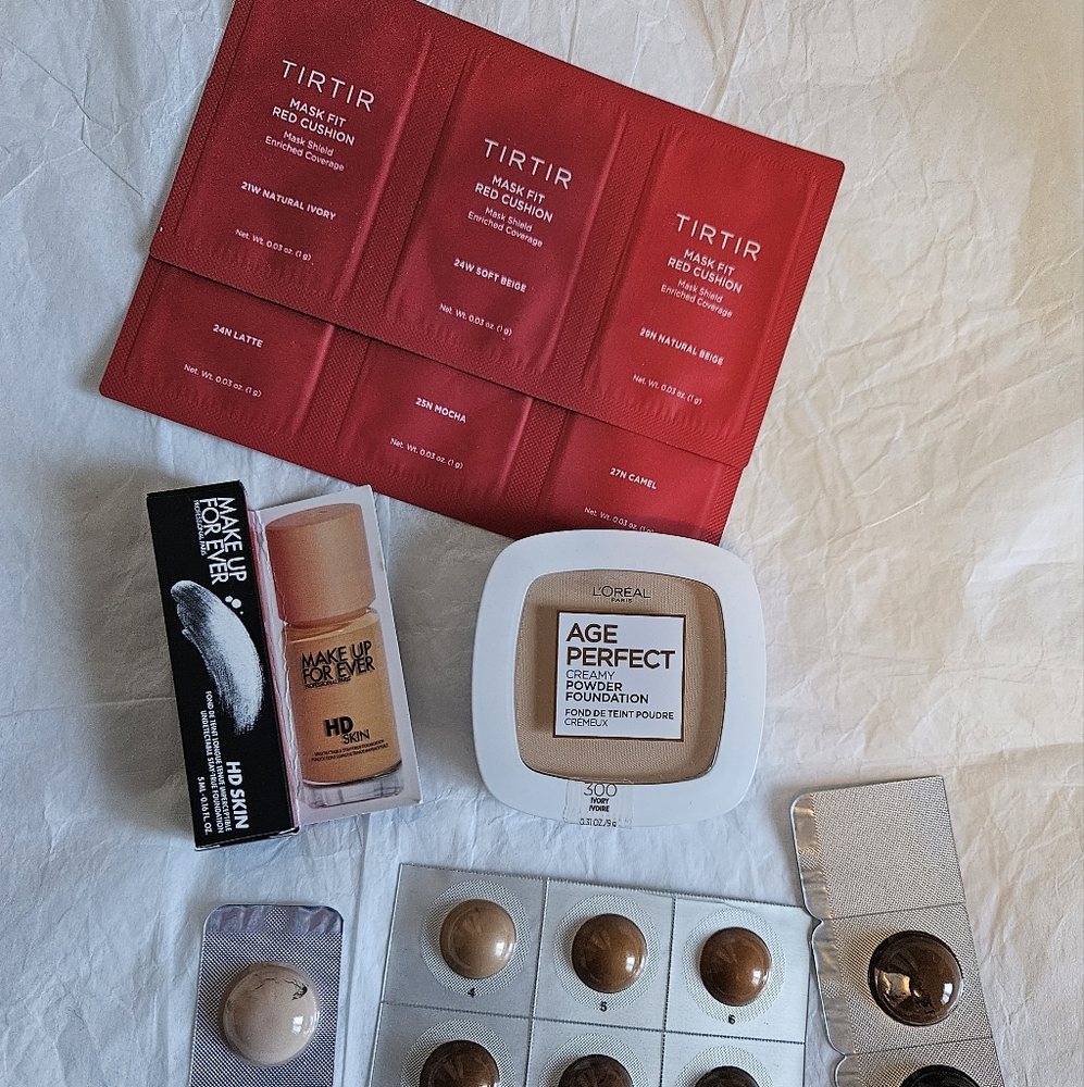 Light Medium foundation and highlighter samples: L'Oreal, Tirtir, MUF, Dior